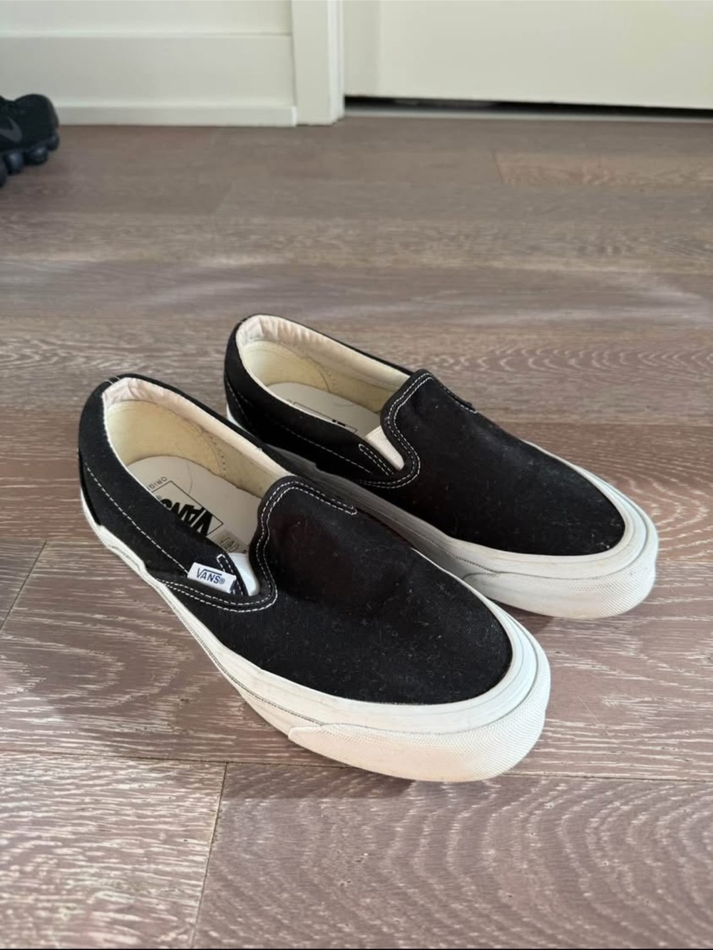 Vans Black and White Slip-On Shoes